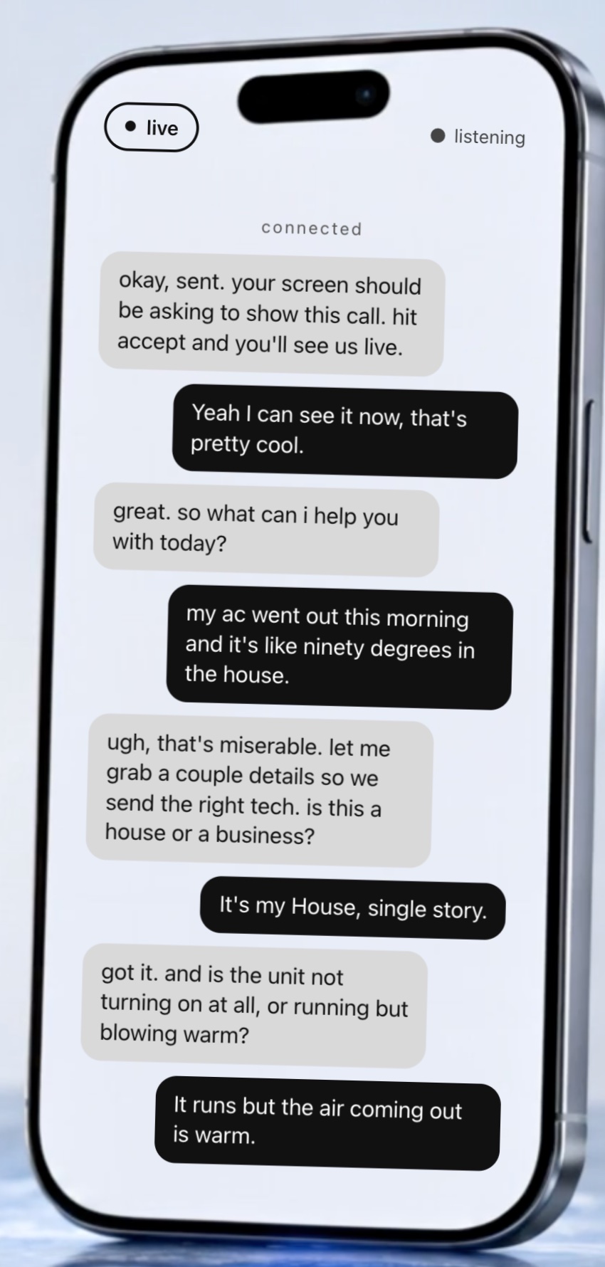 Phone screen streaming a live CSflow call, the conversation rendered as chat bubbles while the agent talks with the caller
